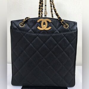 Chanel Black Quilted  Turnlock Caviar Leather W/ 24k Gold Plated bag.